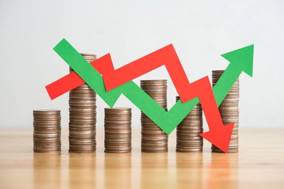 Stack coins and arrow red green graph chart